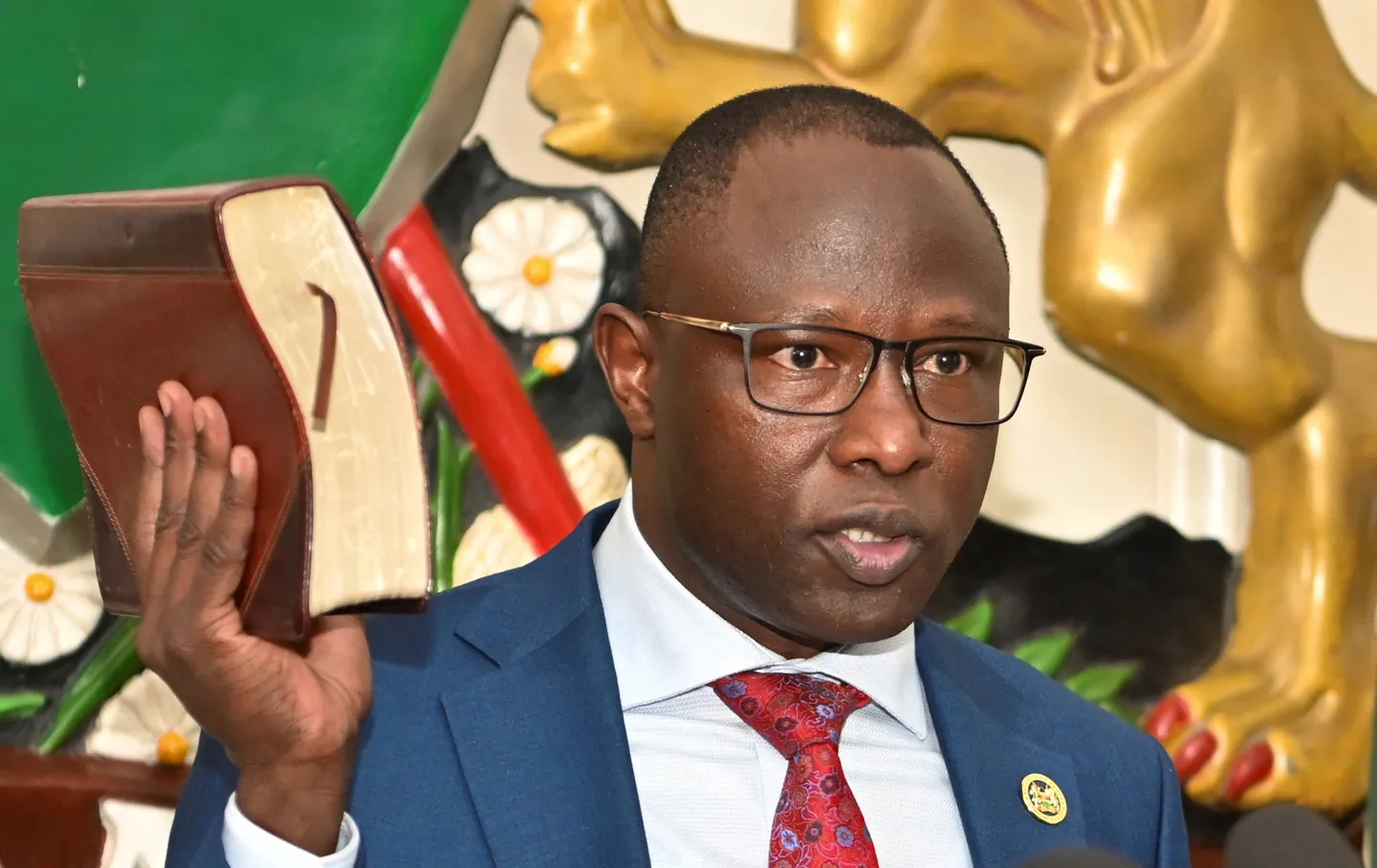 Kenya's new election chief sworn in after president's approval
