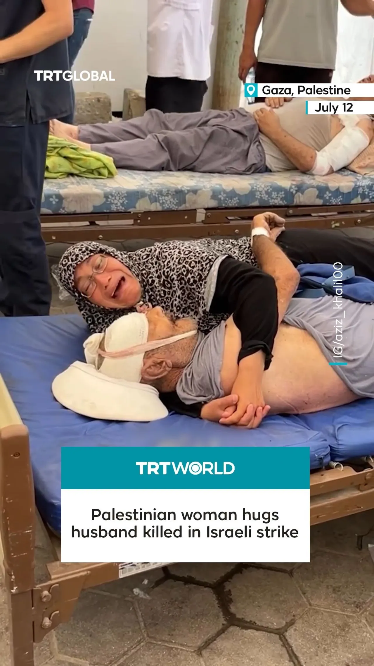 Palestinian woman clings to husband killed in Israeli strike