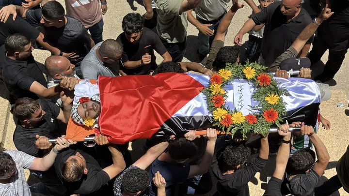 Family of Palestinian-American killed by Israeli settlers pins flicker of hope for justice