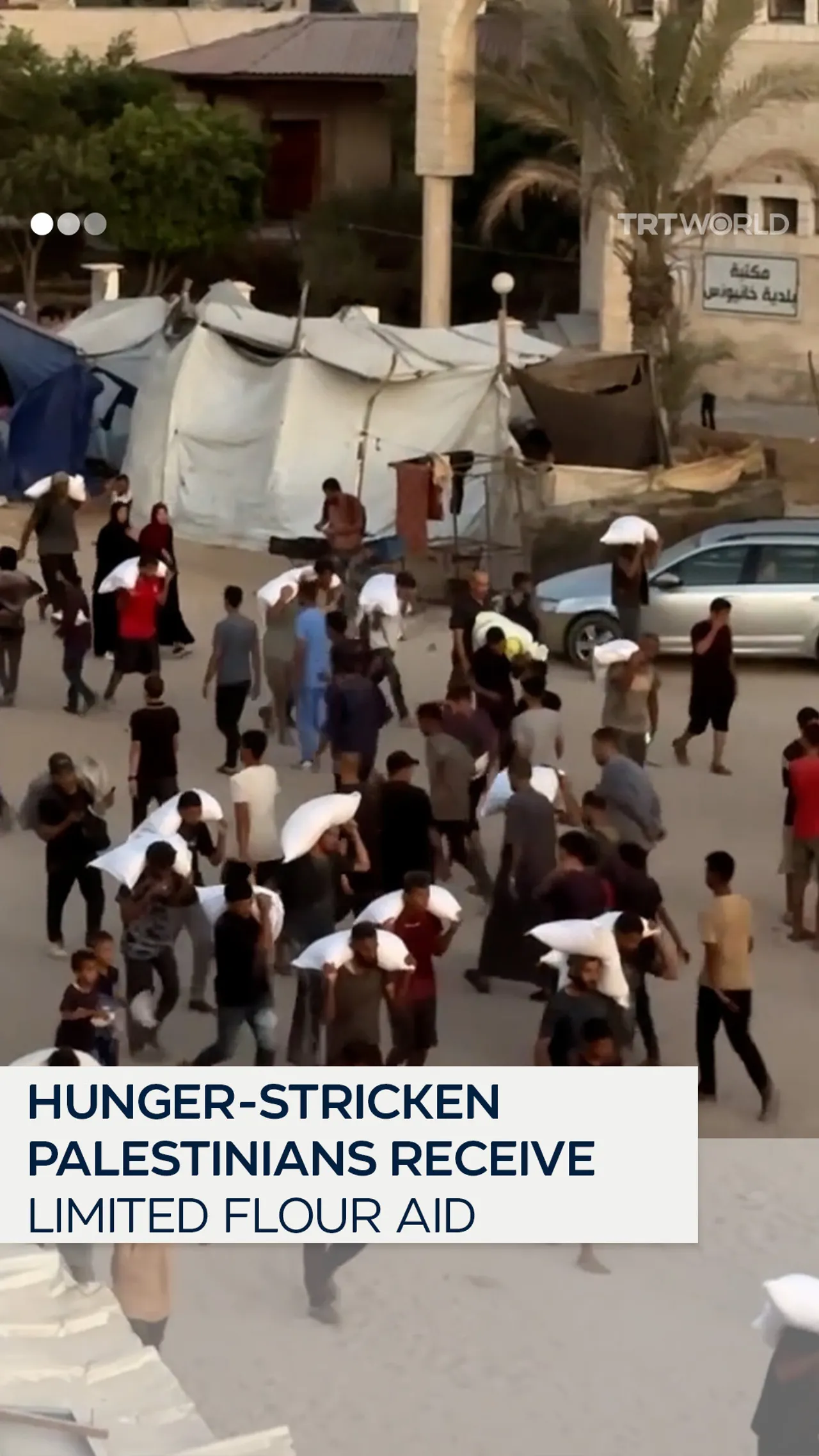 Palestinians flock to aid centres in Gaza amid severe flour shortages