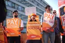 English doctors go on strike over pay, conditions amid rising flu hospitalisations