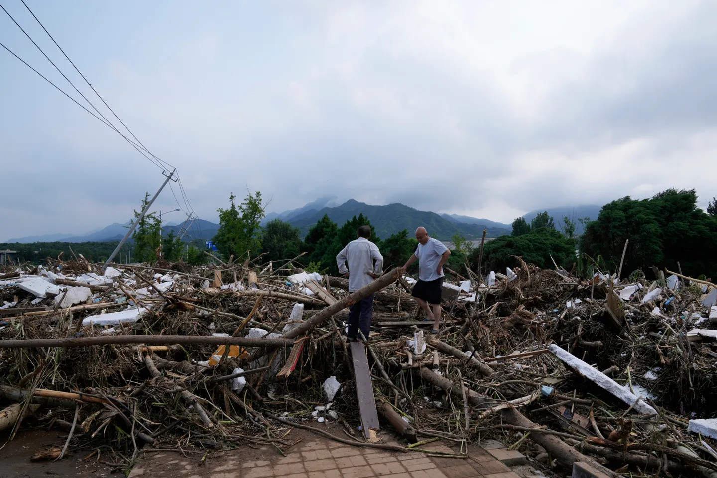 Heavy rain, flooding leave 30 people dead in China's capital