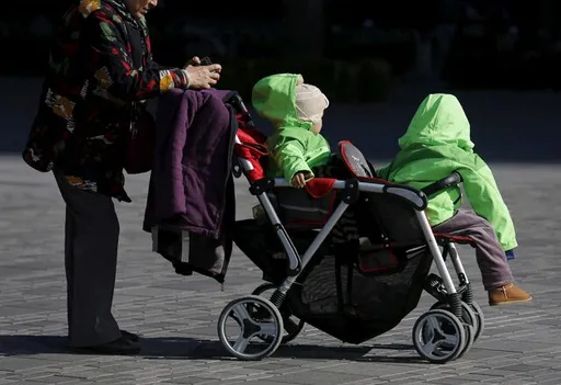 Take $500 and have a baby, China tells young couples as the population ages
