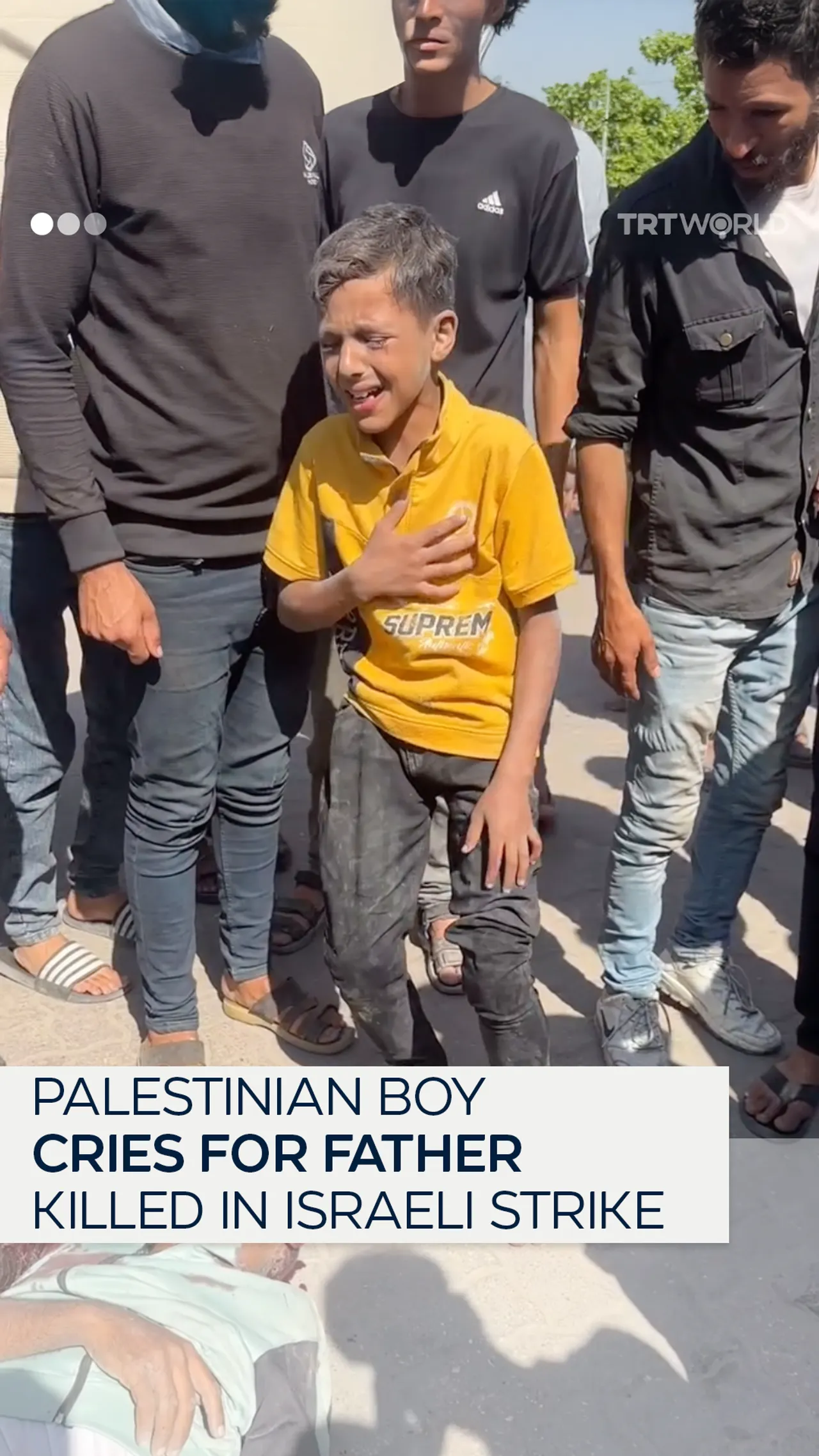 Palestinian boy cries out for his father killed in Israeli strike
