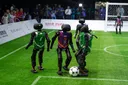 AI-powered humanoid robots play world's first football match in China