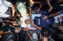 In pictures: Gaza Palestinians hold funeral for journalists killed by Israel in Nasser Hospital