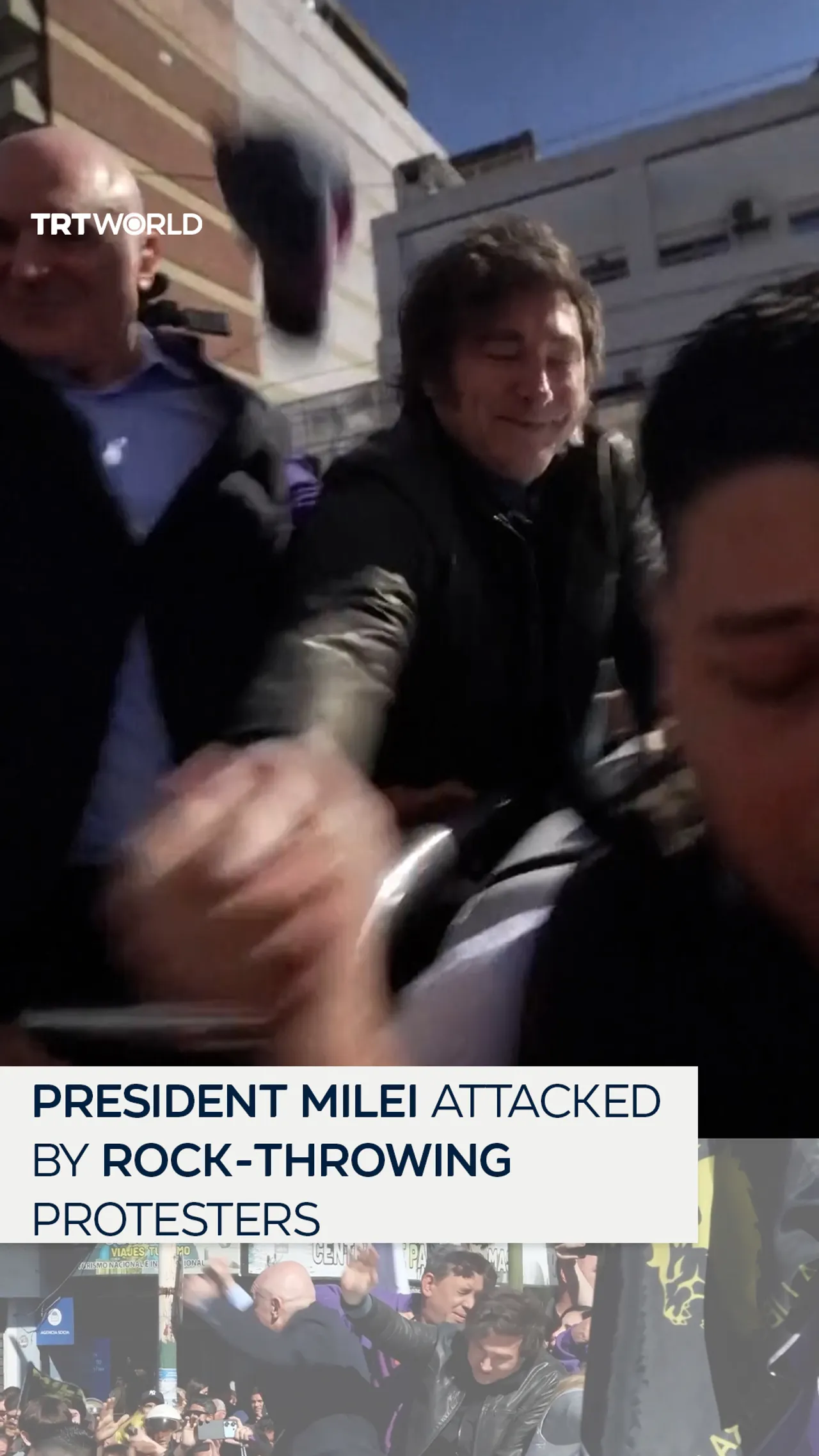President Milei attacked by rock-throwing protesters
