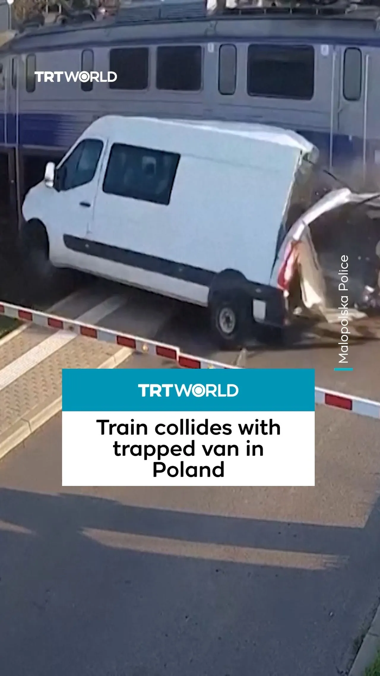 Train collides with van stuck at crossing gate in Poland