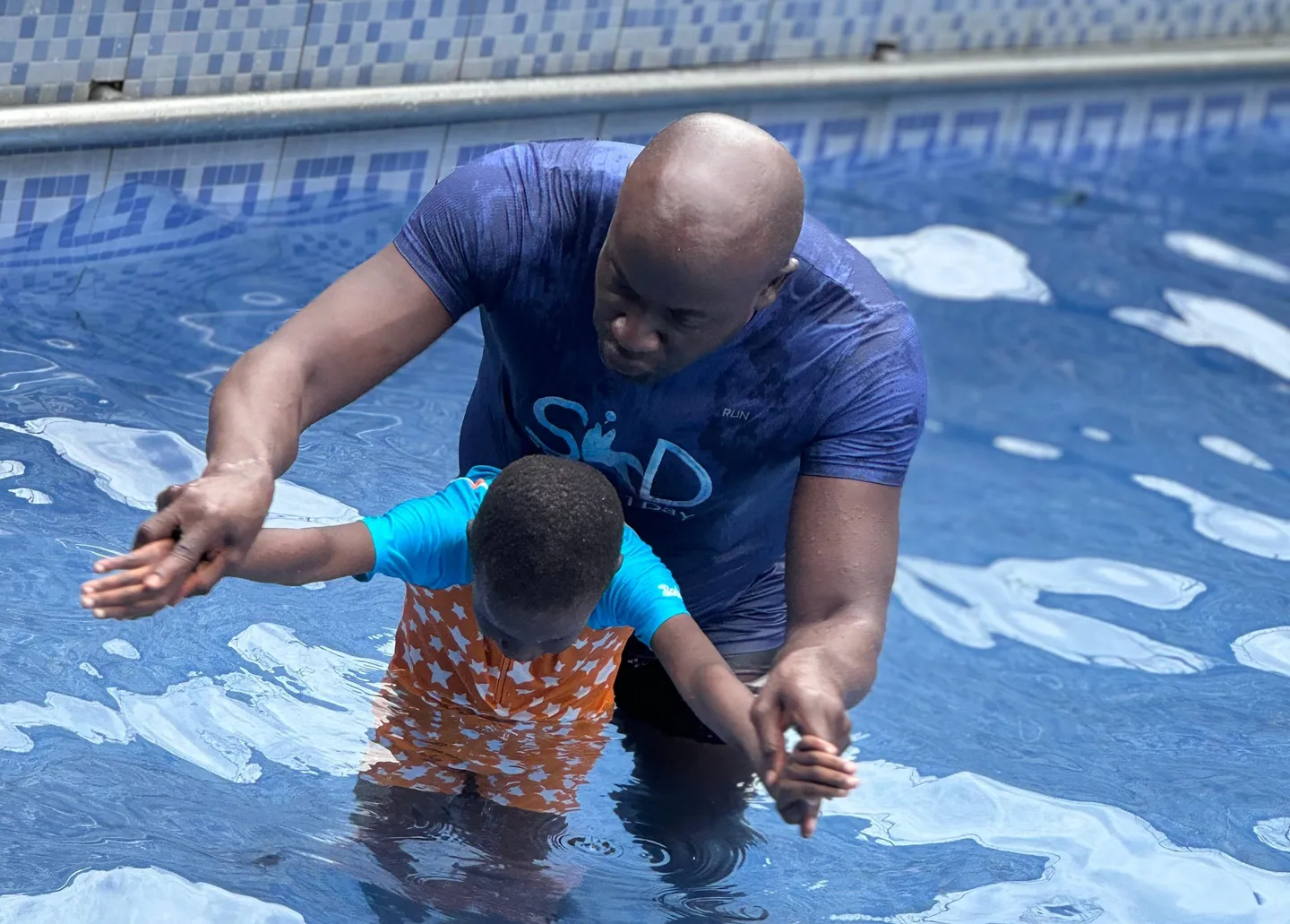 Diving into inclusion: Nigerian coach teaches swimming to children with disabilities
