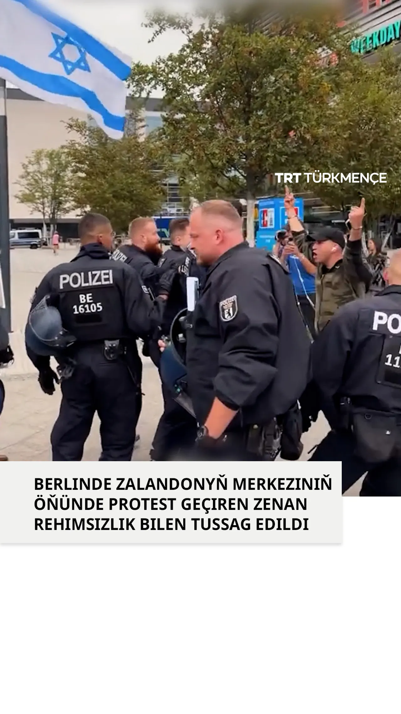 BERLINDE ZALANDONYŇ MERKEZINIŇ ÖŇÜNDE PROTEST GEÇIREN ZENAN REHIMSIZLIK BILEN TUSSAG EDILDI