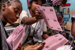 Malawians await results of tight presidential election