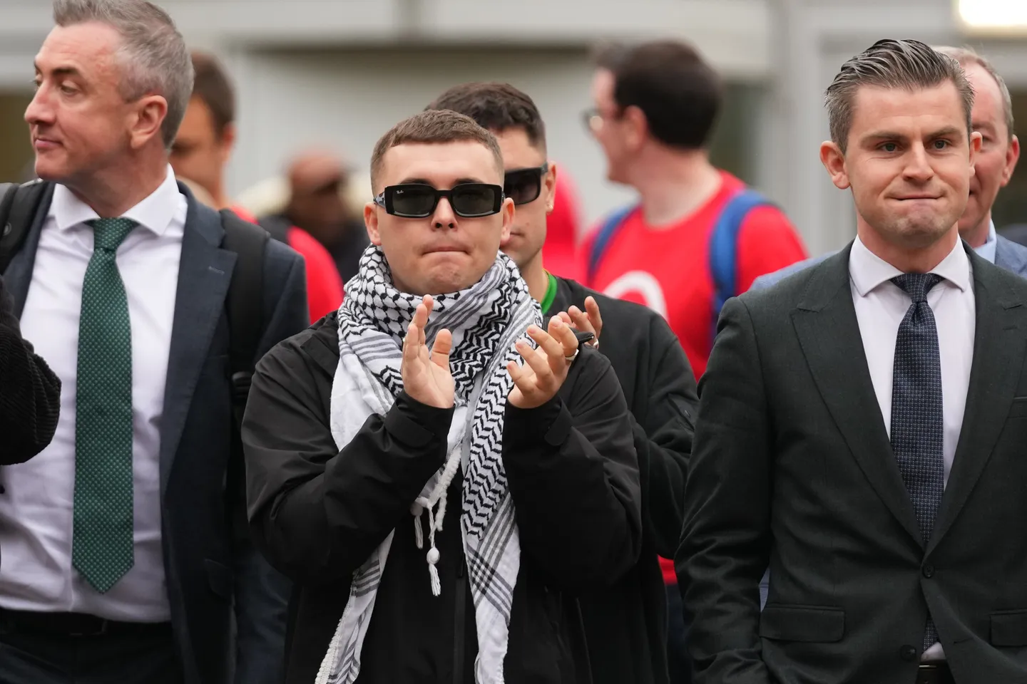 UK prosecutors appeal dismissal of terrorism charge against Kneecap rapper