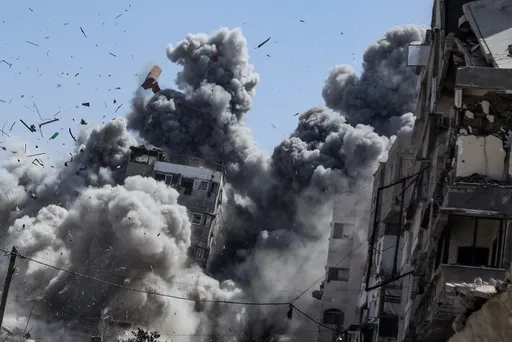 Israel kills nearly 100 Palestinians in attacks across Gaza