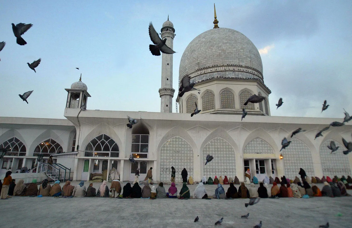 India's national symbol in Kashmir's Muslim shrine sparks outrage, protests