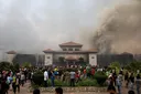 What prompted violent protests in Nepal?
