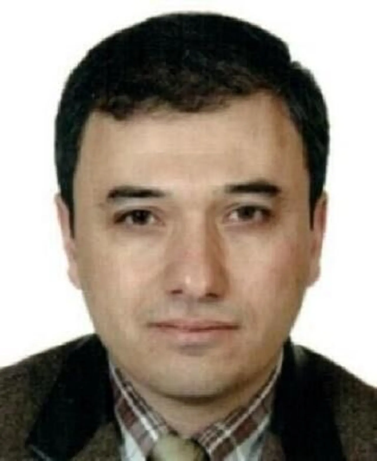 Fugitive linked to Russian envoy's killing changes name, lives in Canada