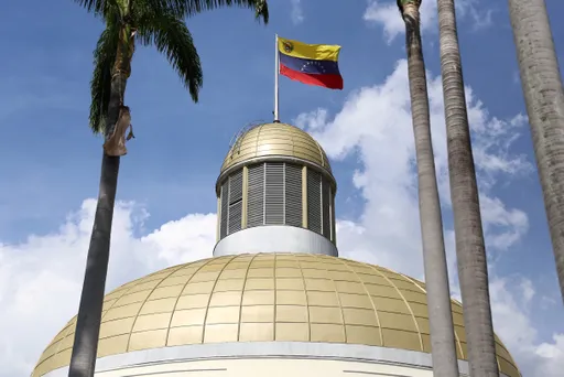 Explosions and gunfire reported near Venezuela's presidential palace