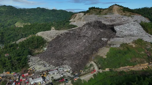 One killed, dozens missing after towering pile of garbage collapses at Philippines landfill