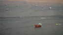 Iran says oil tanker catches fire after hitting mine in Strait of Hormuz