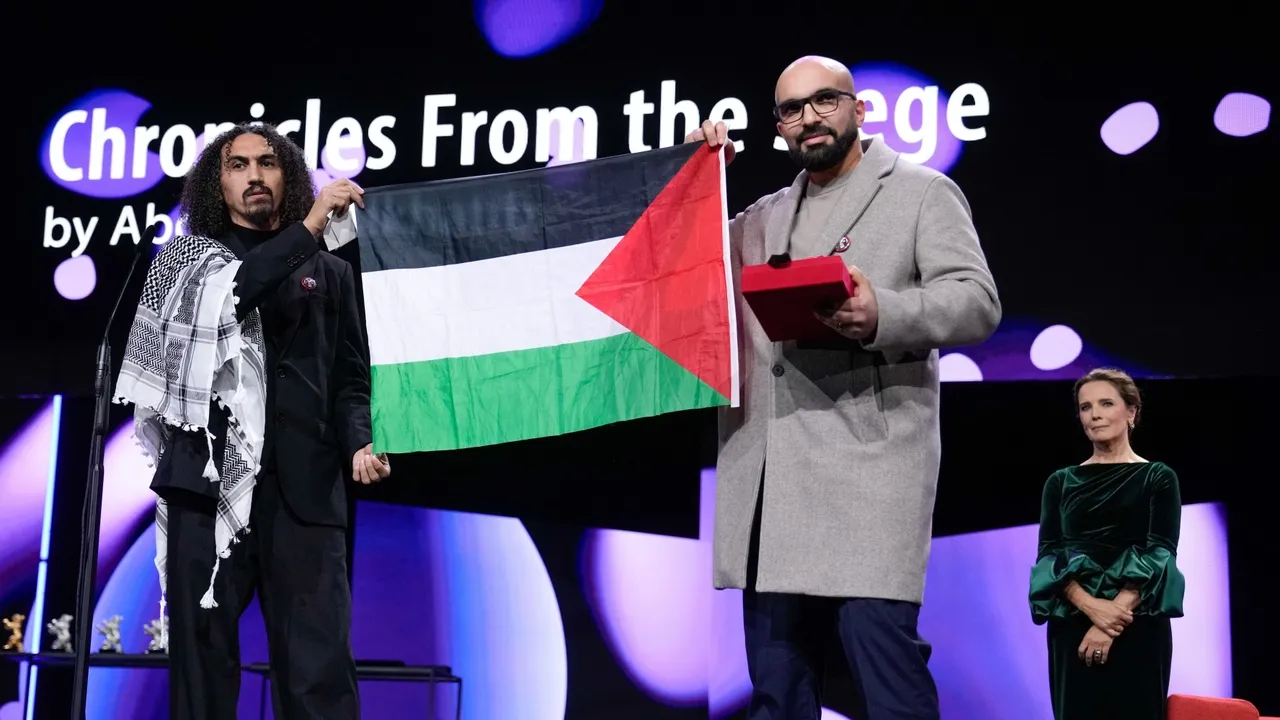 Hundreds of filmmakers back embattled Berlin festival chief over Palestinian flag photo