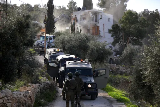 Israeli forces detain 32 Palestinians in raids across occupied West Bank