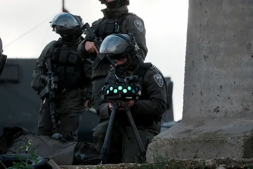 Israeli army raids West Bank refugee camp, evacuates homes for military use