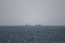 Iran closes Strait of Hormuz, warns ships of attack if they try to pass