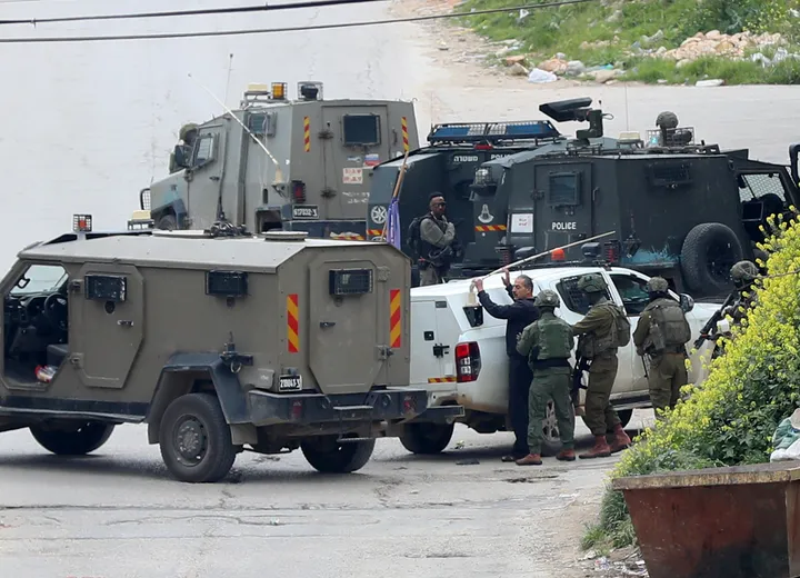 Israeli reservists say troops ignored settler attacks on Palestinians in occupied West Bank