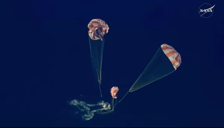 Orion spacecraft, carrying Artemis II astronauts, touches down on Earth in Pacific splashdown