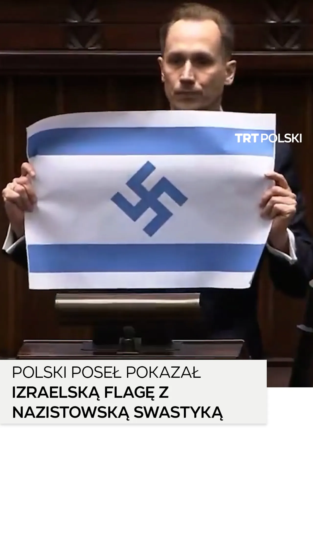 Polski poseł pokazał izraelską flagę z nazistowską swastyką