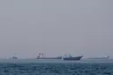 Iranian gunboat fires at container ship off Oman coast: maritime agency