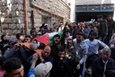 West Bank town grieves after child and man killed in Israeli settler attack