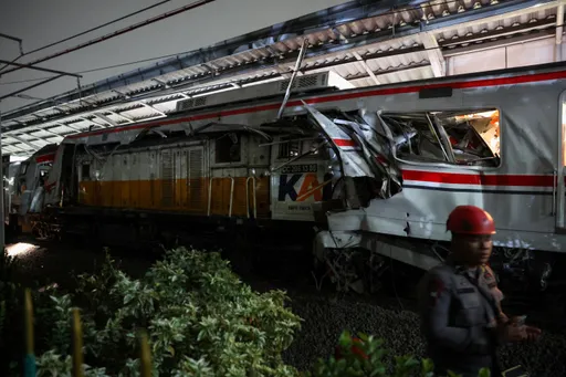 Train crash in Indonesia's West Java kills 14 after taxi triggers deadly collision