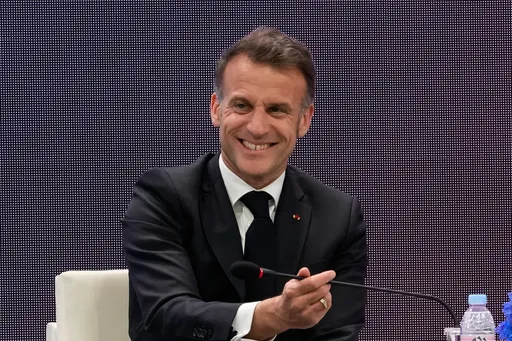 Macron warns against opening 'Pandora's box' on Iran, mulls peaceful means to open Hormuz