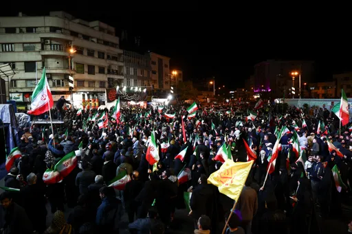 In pictures: Thousands take to streets in Tehran after ceasefire with US announced