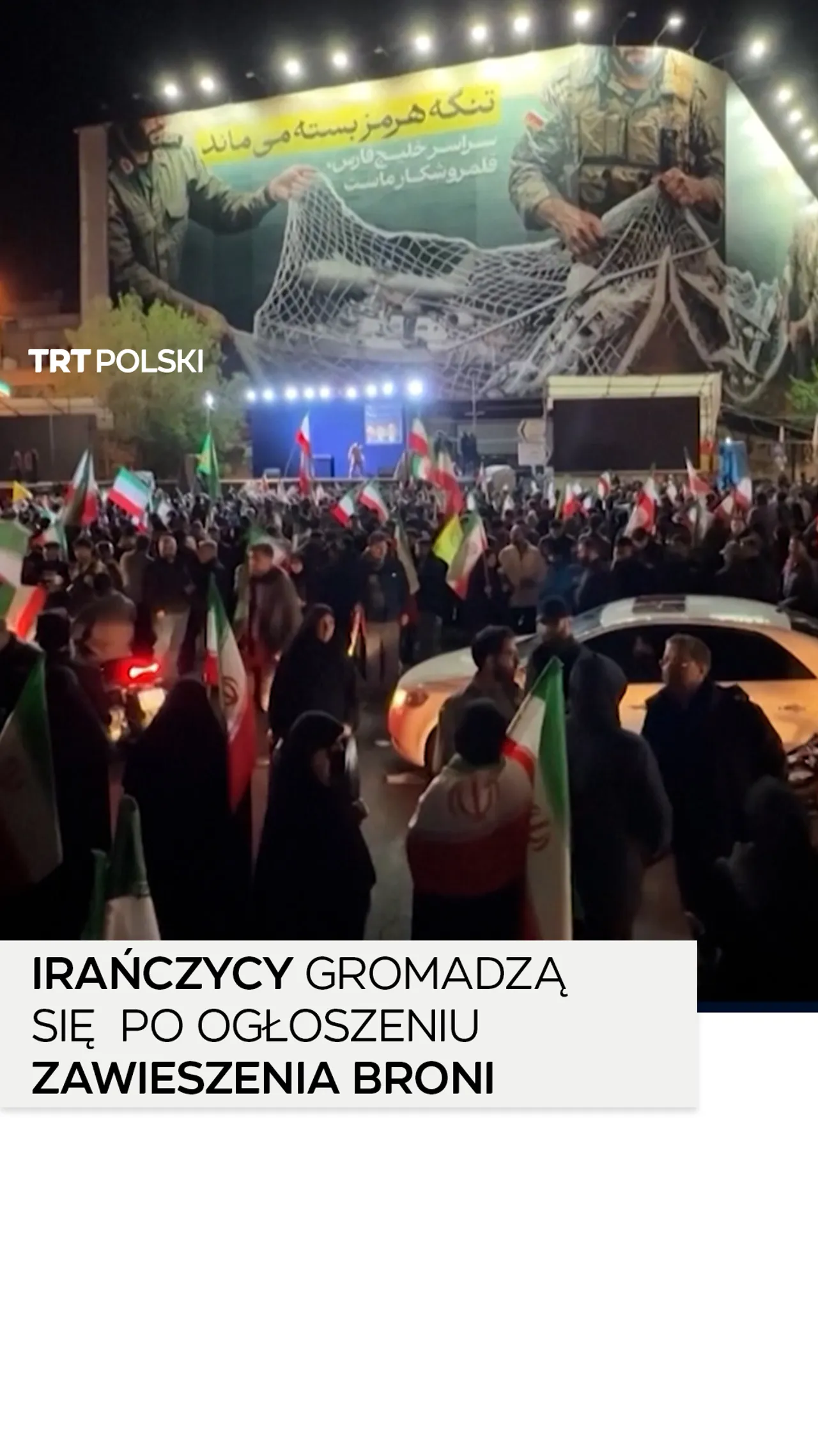 Irańczycy gromadzą się i machają narodowymi flagami po ogłoszeniu zawieszenia broni