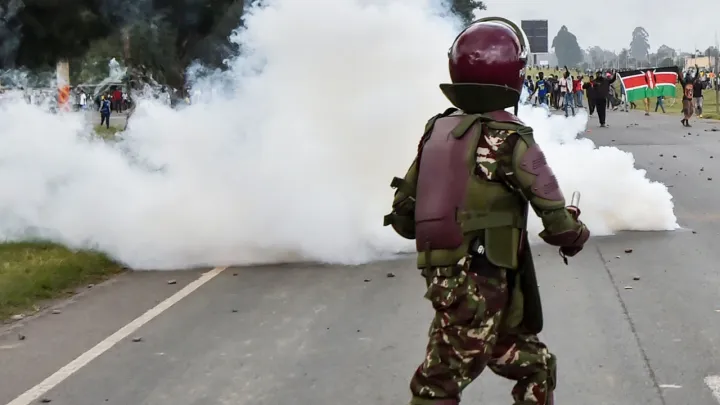 Kenya police use teargas to disperse anti-France protesters near summit co-hosted by Macron