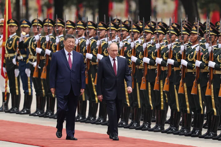 Putin and Xi meet in Beijing days after Trump's high-profile China visit