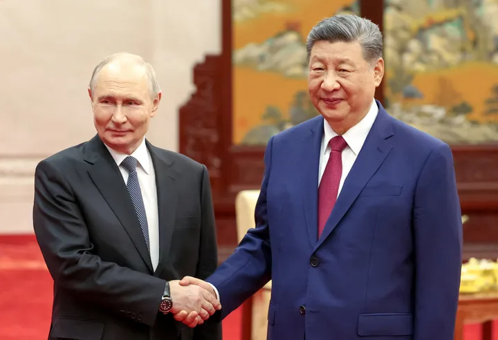 Putin wraps up two-day China trip after talks with Xi