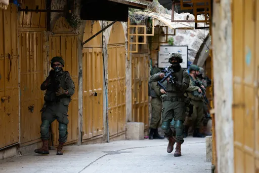 Israeli army raids occupied West Bank towns, forcing shop closures during Eid rush