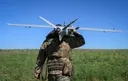 Ukrainian drones hit a port and an oil depot in southern Russia: officials