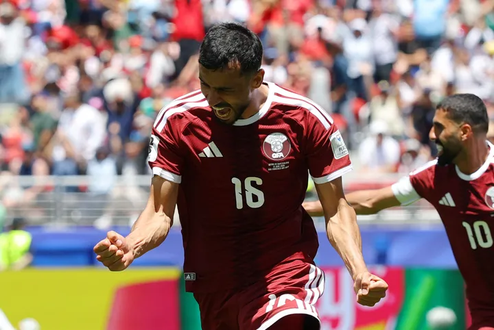 Qatar score late equaliser against Switzerland to earn first World Cup point