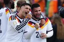 Germany beat Ivory Coast 2-1 to secure knockout stage ticket