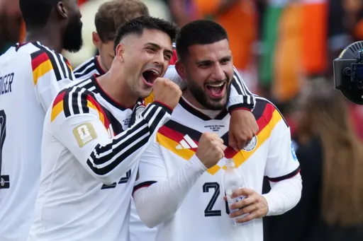 Germany beat Ivory Coast 2-1 to secure knockout stage ticket