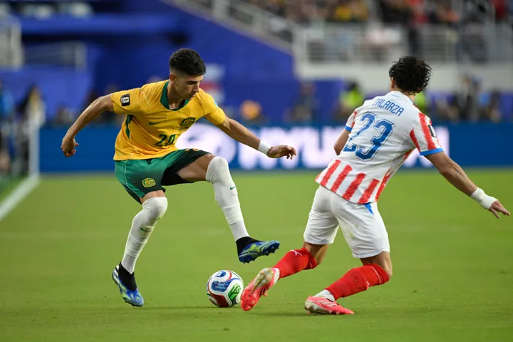 Australia lolos ke babak knockout Piala Dunia setelah hasil imbang tanpa gol melawan Paraguay