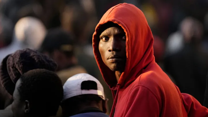 South Africa's anti-migrant deadline forces fathers to leave families behind