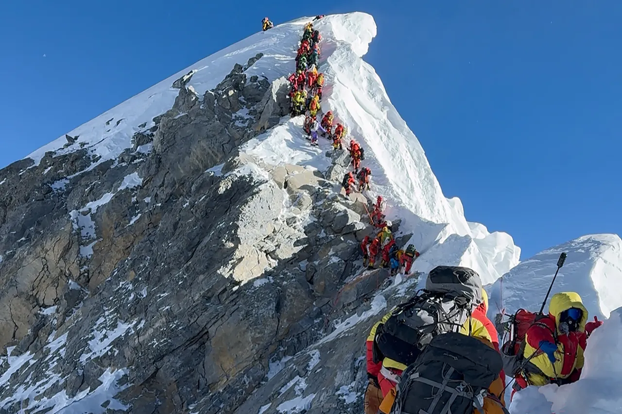 Over 1,000 climbers reach Mount Everest summit in record-breaking season