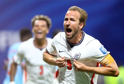 England survive early scare from DRC and advance at World Cup on two late goals from Harry Kane