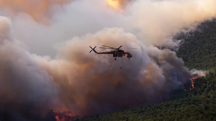 Two firefighting helicopters collide in Greece while battling wildfire