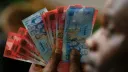 Ghana's currency back under pressure, Uganda's on front foot